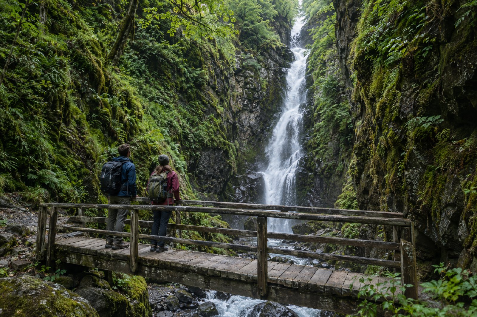 Hikers at the Gveleti waterfall near Stepantsminda